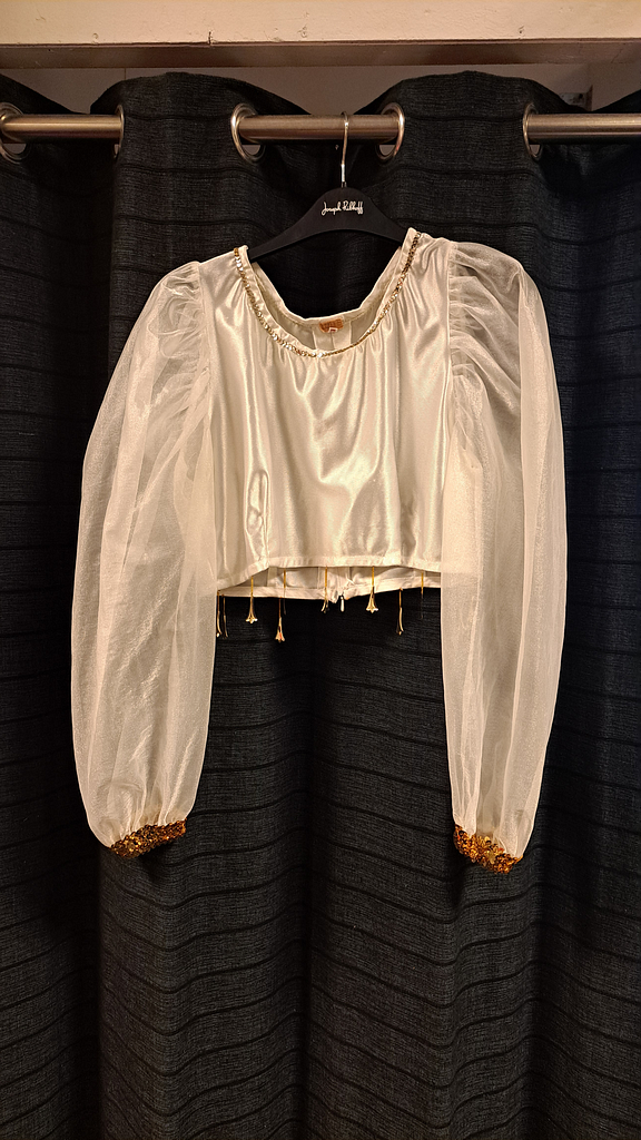 Korte blouse goud afgezet