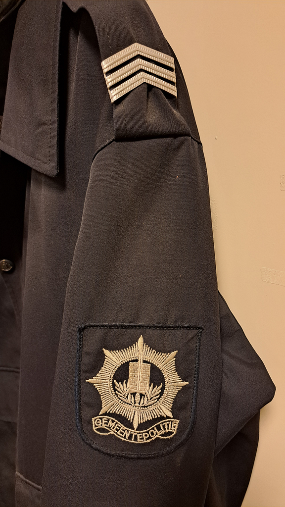 Gemeente politie jas met pet