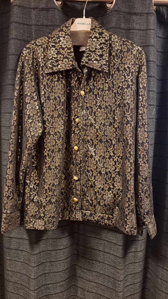 Zwarte blouse met gouden bloemen motief 