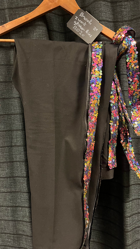 Zwarte broek met glitterbies