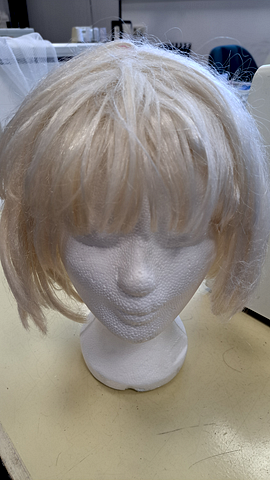 Pruik half lang hoog blond