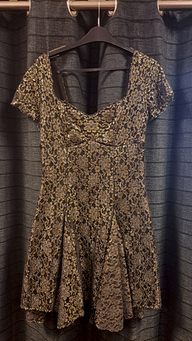 Jurk goud zwart bloemmotief 