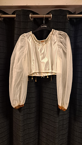 Korte blouse goud afgezet