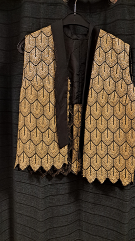 Gilet gouden schubbenmotief