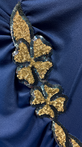 Blauwe galajurk met glitterdetail