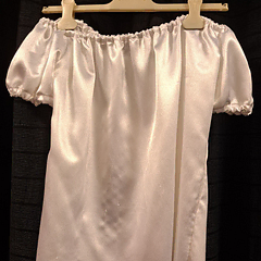 Witte glimmende blouse